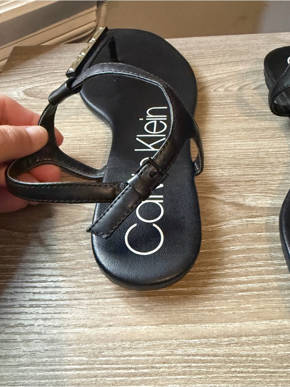 Calvin Klein Black T-Strap Sandals with Metallic Accents - Picture 2 of 3